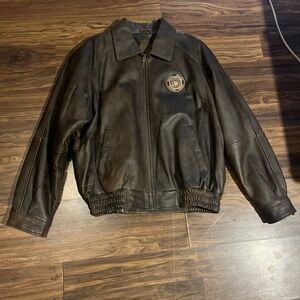 Vintage Burks bay branded marine corp leather jacket.